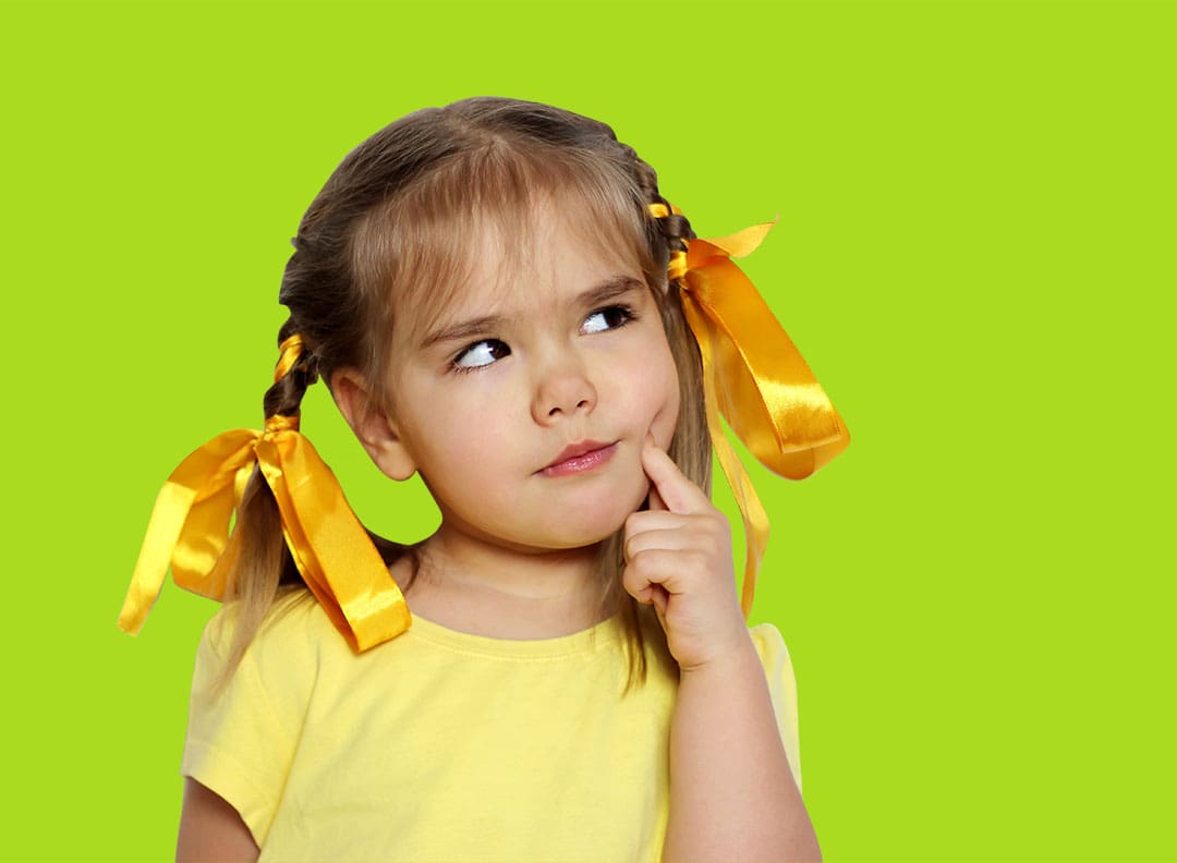 young girl with ribbons in her hair thinking about something