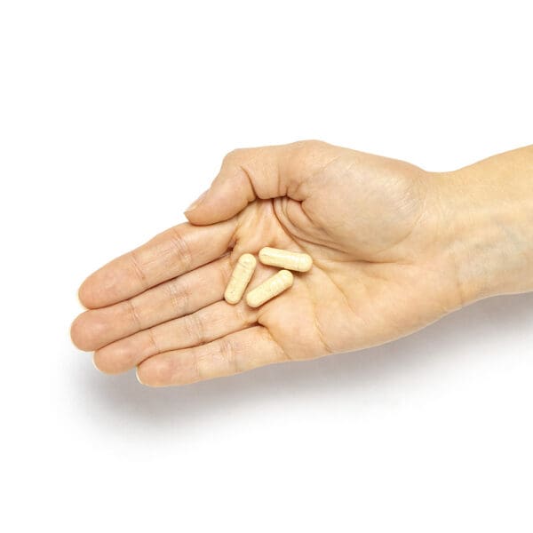 BioFe Women's multivitamin capsules in hand